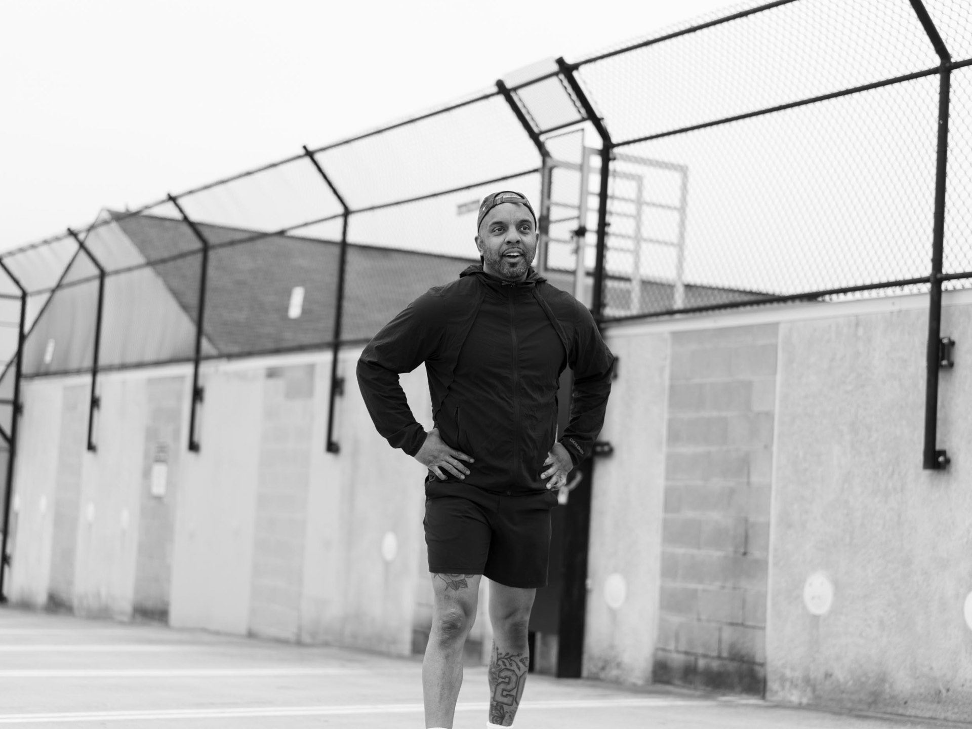 Mike Snape standing confidently after a run